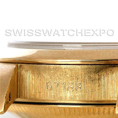 This image shows a close-up of the side of a Rolex President 67188 Women
s Yellow Gold Blue Dial 67188 Women
s Yellow Gold Blue Dial model watch, highlighting its case and serial number.