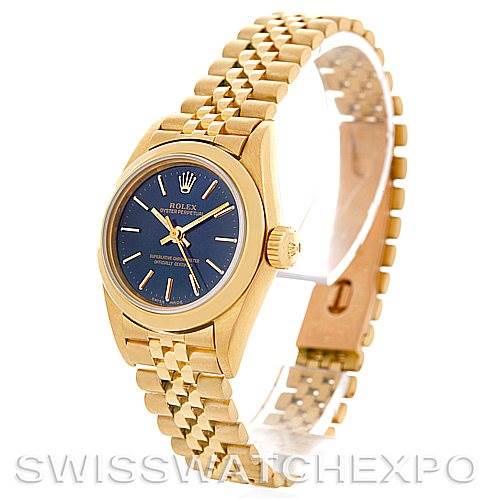 This image shows a Rolex President 67188 Women
s Yellow Gold Blue Dial 67188 Women
s Yellow Gold Blue Dial model watch with a gold case and band, blue dial, and a partial side view.