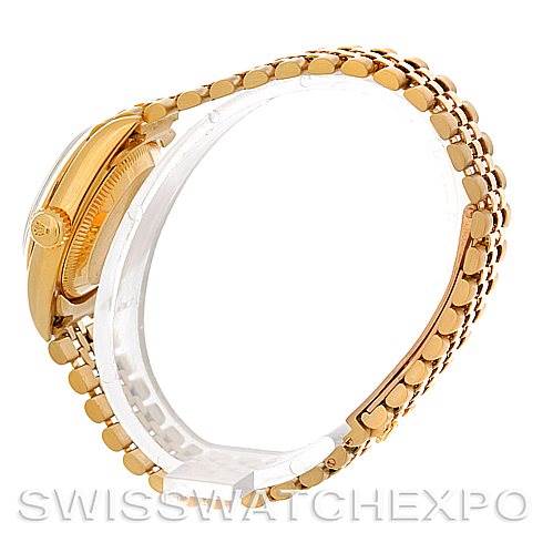 This image shows a side view of the Rolex President 67188 Women
s Yellow Gold Blue Dial 67188 Women
s Yellow Gold Blue Dial model watch, focusing on the gold bracelet and case.