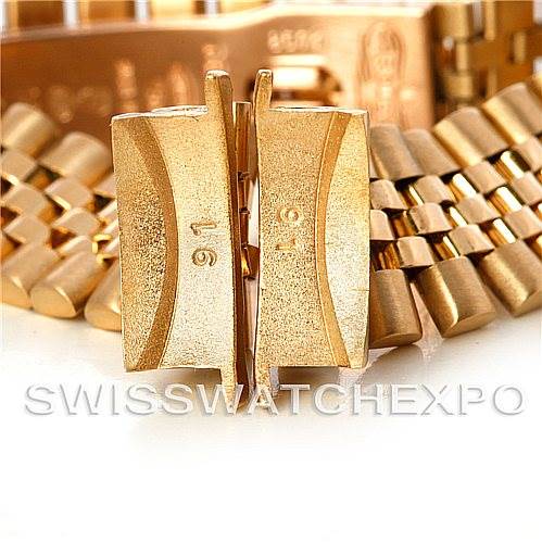 The image shows a close-up of the clasp and bracelet links of a Rolex President 67188 Women
s Yellow Gold Blue Dial 67188 Women
s Yellow Gold Blue Dial model watch.