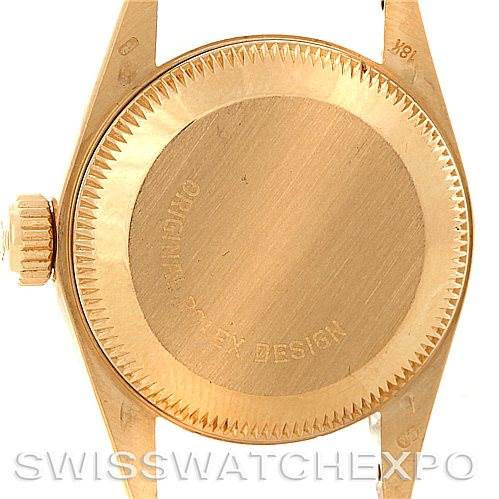 This image shows the back case and crown of a Rolex President 67188 Women
s Yellow Gold Blue Dial 67188 Women
s Yellow Gold Blue Dial model watch viewed from the rear.