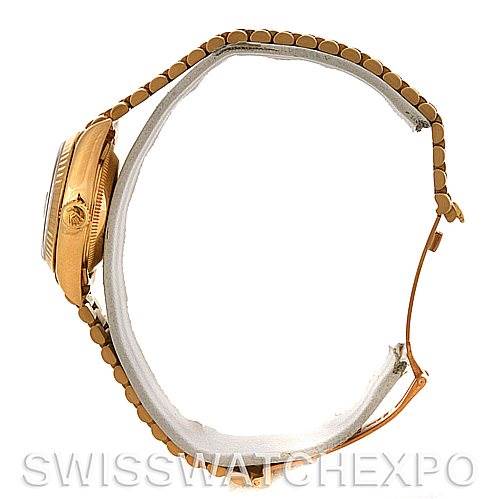 The image shows a side view of a Rolex President 69178 Women's Yellow Gold Black Dial 69178 Women's Yellow Gold Black Dial model watch, highlighting its case, crown, and part of the bracelet.