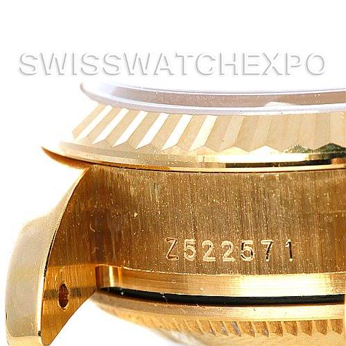 This image shows a side view of the bezel and case, including the serial number, of a Rolex President 179178 Women
s Yellow Gold Silver Dial 179178 Women
s Yellow Gold Silver Dial model watch.