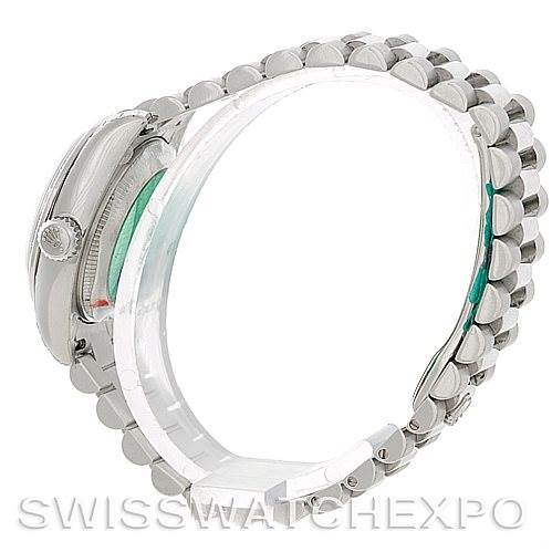 The image shows a side view of the Cartier Tank Française watch, emphasizing its crown and metal bracelet.