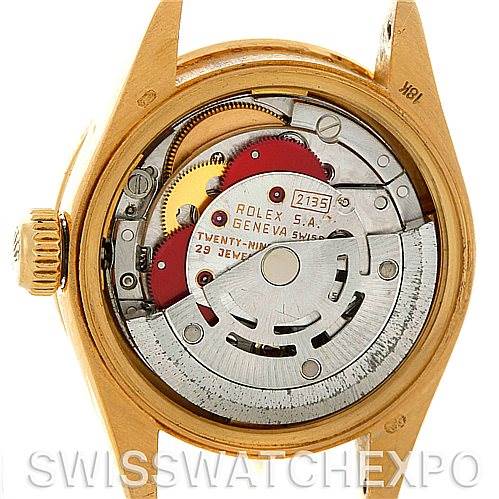 This image shows the back view of the Rolex President 69278 Women's Yellow Gold Champagne Dial 69278 Women's Yellow Gold Champagne Dial model, highlighting its internal mechanical movement components.