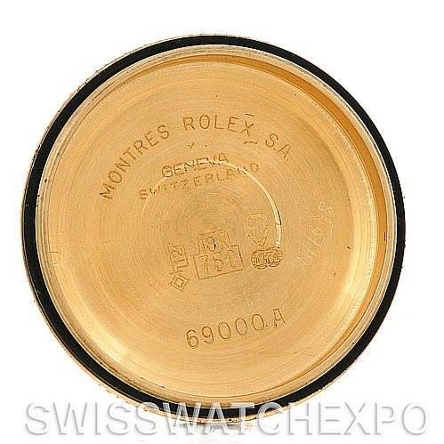 The image shows the inside case back of a Rolex President 69278 Women's Yellow Gold Champagne Dial 69278 Women's Yellow Gold Champagne Dial model watch, displaying inscriptions and identifying numbers.