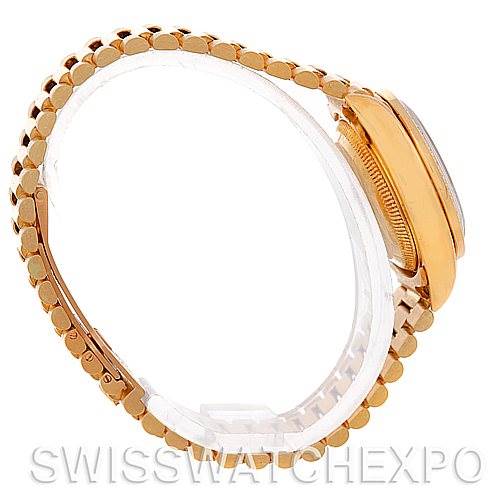 The image shows a side view of a Rolex President 69278 Women's Yellow Gold Champagne Dial 69278 Women's Yellow Gold Champagne Dial model, mainly displaying its bracelet and case.