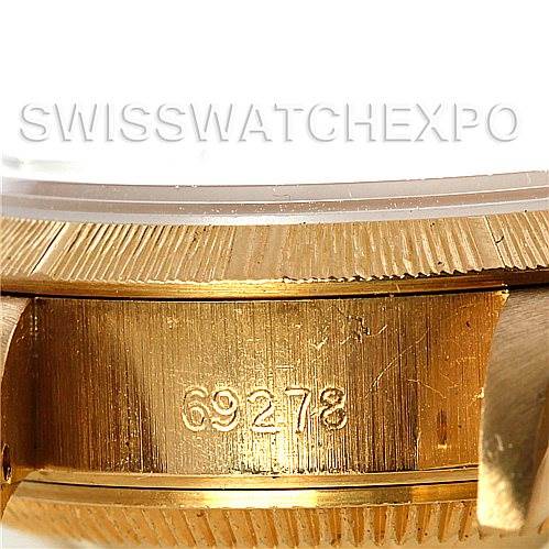 This image shows the serial number engraving on the gold case side of a Rolex President 69278 Women's Yellow Gold White Dial 69278 Women's Yellow Gold White Dial model watch.