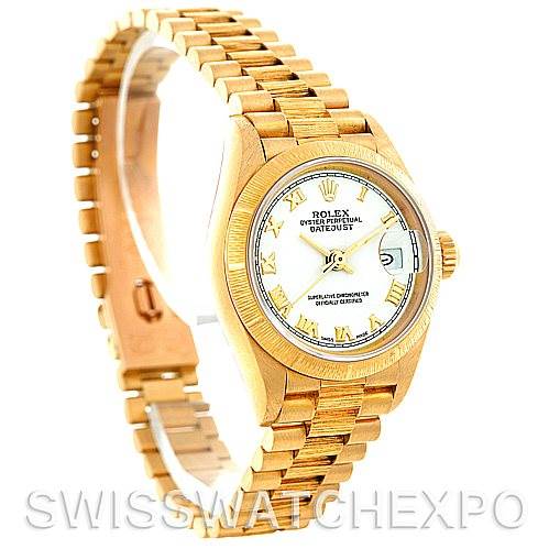 The image shows a Rolex President 69278 Women's Yellow Gold White Dial 69278 Women's Yellow Gold White Dial model watch at a slight angle, highlighting the face, bezel, and partly extended bracelet.