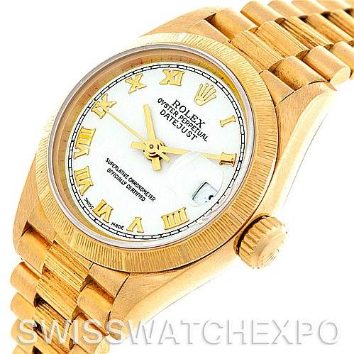 This image shows a Rolex President 69278 Women's Yellow Gold White Dial 69278 Women's Yellow Gold White Dial model watch at an angle highlighting the dial, case, crown, and part of the bracelet.