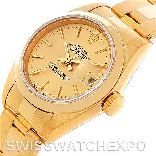 The image shows a Rolex President 69168 Women's Yellow Gold Champagne Dial 69168 Women's Yellow Gold Champagne Dial model watch from an angled view featuring the dial, crown, and part of the bracelet.