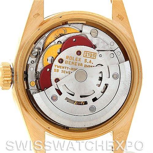 The image shows the open back of a Rolex President 69168 Women's Yellow Gold Champagne Dial 69168 Women's Yellow Gold Champagne Dial model watch, revealing its internal mechanical movement components.