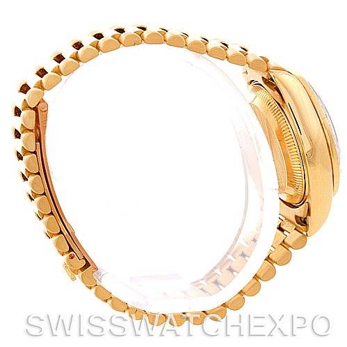 This image shows a side view of a Rolex President 69138 Women's Yellow Gold Champagne Dial 69138 Women's Yellow Gold Champagne Dial model watch, focusing on the bracelet and the case side.