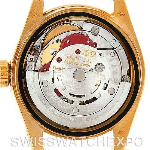 The image shows the back view of a Rolex President 69138 Women's Yellow Gold Champagne Dial 69138 Women's Yellow Gold Champagne Dial model watch, exposing its internal mechanical movement.
