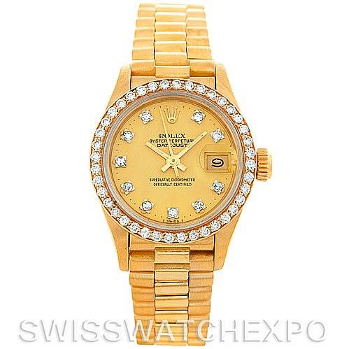 This image shows a frontal view of a Rolex President 69138 Women's Yellow Gold Champagne Dial 69138 Women's Yellow Gold Champagne Dial model watch, highlighting its gold bracelet and diamond-encrusted bezel.
