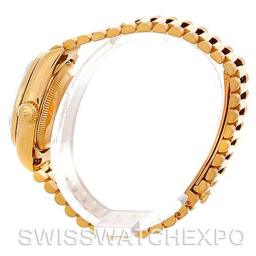This image shows a side view of a Rolex President 69138 Women's Yellow Gold Champagne Dial 69138 Women's Yellow Gold Champagne Dial model, highlighting its gold case and bracelet.