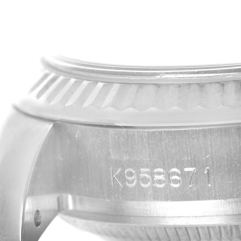 This image shows a close-up of the case side and bezel of the Rolex President 179179 Women's White Gold Mother of Pearl Dial 179179 Women's White Gold Mother of Pearl Dial model watch, featuring the serial number.