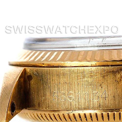 The image shows a close-up of the gold case side and bezel of a Rolex President 6719 Women
s Yellow Gold Champagne Dial 6719 Women
s Yellow Gold Champagne Dial model watch with visible serial numbers.