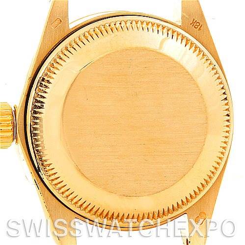 This image shows the back case and crown of a Rolex President 6917 Women's Yellow Gold Champagne Dial 6917 Women's Yellow Gold Champagne Dial model, highlighting the watch's rear side.