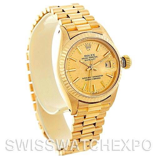 The image shows a Rolex President 6917 Women's Yellow Gold Champagne Dial 6917 Women's Yellow Gold Champagne Dial model watch at a three-quarter angle, displaying its bracelet, dial, crown, and date window.