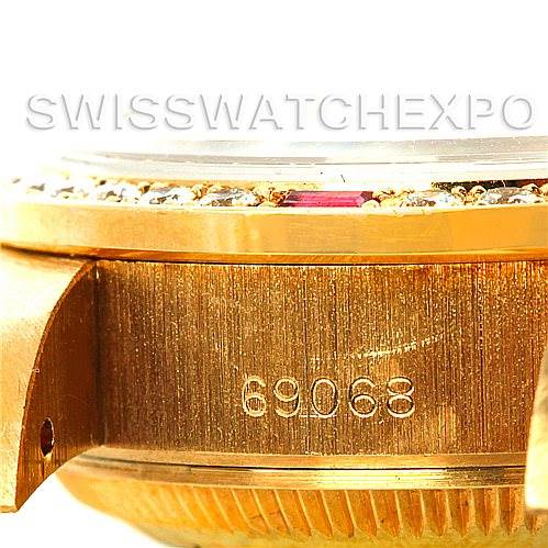 The image shows a close-up of the side and bezel of a Rolex President 69068 Women
s Yellow Gold Mother of Pearl Dial 69068 Women
s Yellow Gold Mother of Pearl Dial model watch, highlighting the serial number.