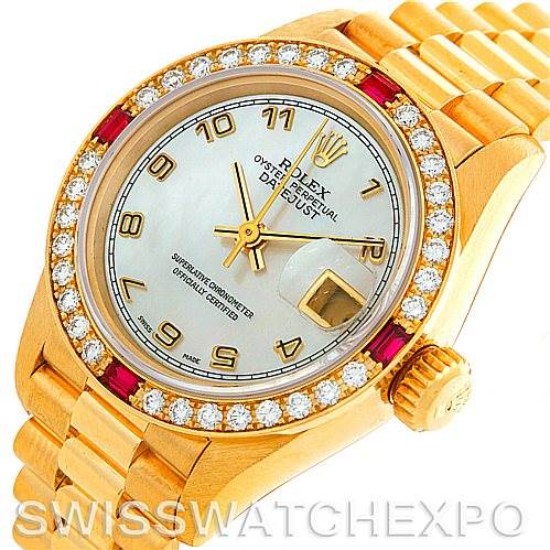 The image shows a Rolex President 69068 Women
s Yellow Gold Mother of Pearl Dial 69068 Women
s Yellow Gold Mother of Pearl Dial model watch at an angled top view, highlighting the face, bezel, and bracelet.