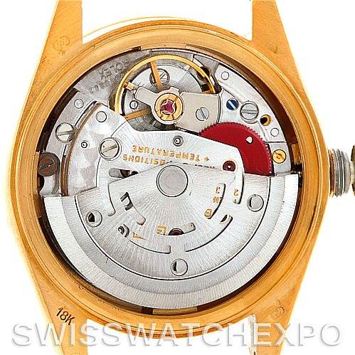 This image shows the movement of the Rolex President 69278 Women's Yellow Gold Champagne Dial 69278 Women's Yellow Gold Champagne Dial model watch from a caseback angle, featuring its intricate internal mechanics.