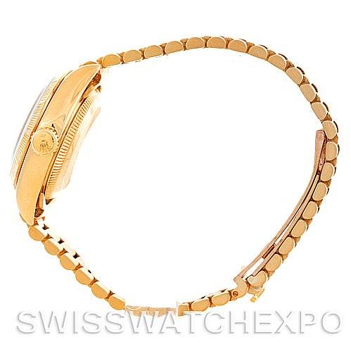 The image shows a side view of the Rolex President 69278 Women's Yellow Gold Champagne Dial 69278 Women's Yellow Gold Champagne Dial model watch, highlighting the case, crown, and part of the bracelet.