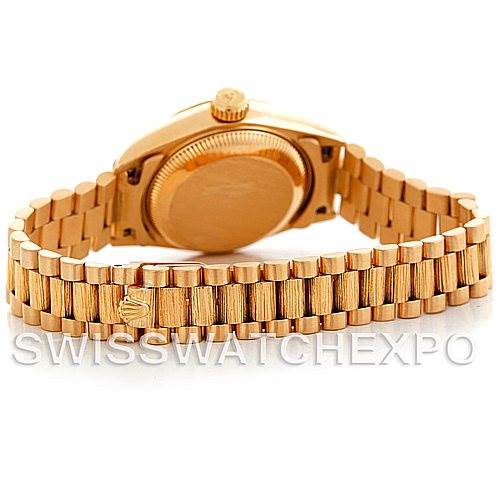 The image shows the backside and bracelet of a Rolex President 69278 Women's Yellow Gold Champagne Dial 69278 Women's Yellow Gold Champagne Dial model watch with a gold finish.