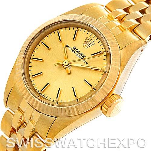 This Rolex President 6719 Women's Yellow Gold Champagne Dial 6719 Women's Yellow Gold Champagne Dial model watch is shown from an angled view, highlighting its face, bezel, crown, and bracelet.