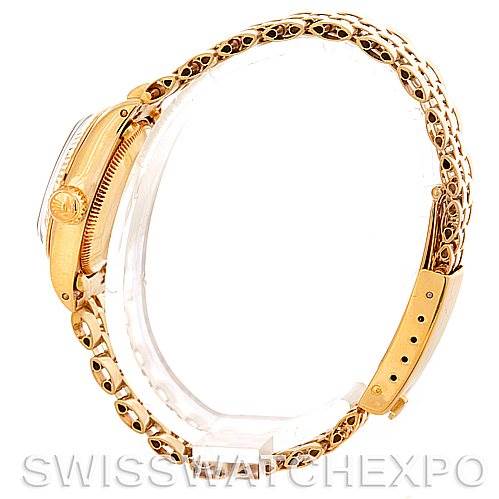 This image shows a side view of the Rolex President 6719 Women's Yellow Gold Champagne Dial 6719 Women's Yellow Gold Champagne Dial model watch, highlighting the case, crown, and bracelet.