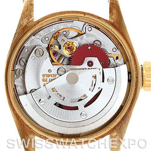 The image shows the inner mechanical movement parts of the Rolex President 6719 Women's Yellow Gold Champagne Dial 6719 Women's Yellow Gold Champagne Dial model watch from a back angle with the case back removed.