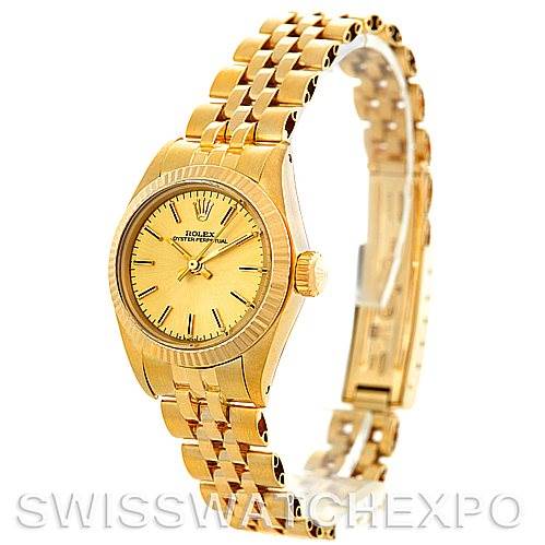 This image shows a Rolex President 6719 Women's Yellow Gold Champagne Dial 6719 Women's Yellow Gold Champagne Dial watch at a 3/4 angle, highlighting its gold dial, case, and bracelet.