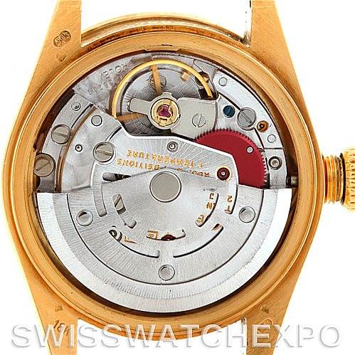 This image shows the movement and inner mechanics of the Rolex President 69138 Women's Yellow Gold Champagne Dial 69138 Women's Yellow Gold Champagne Dial model watch from a rear angle.