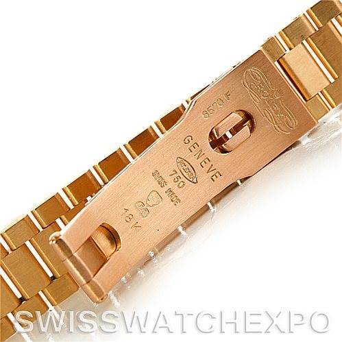 This image shows the clasp of a Rolex President 69138 Women's Yellow Gold Champagne Dial 69138 Women's Yellow Gold Champagne Dial model watch, highlighting the engraved markings and part of the bracelet.