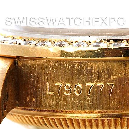 This close-up image shows the side view of the case with the serial number of a Rolex President 69138 Women's Yellow Gold Champagne Dial 69138 Women's Yellow Gold Champagne Dial model watch.
