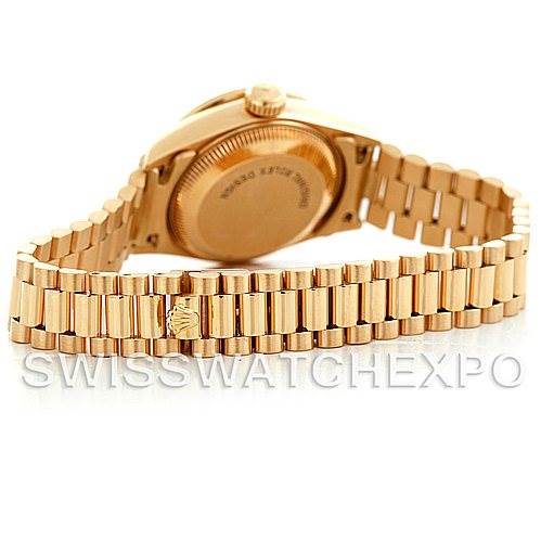 This image shows the back view of the Rolex President 69138 Women's Yellow Gold Champagne Dial 69138 Women's Yellow Gold Champagne Dial model watch, highlighting its gold case and bracelet.