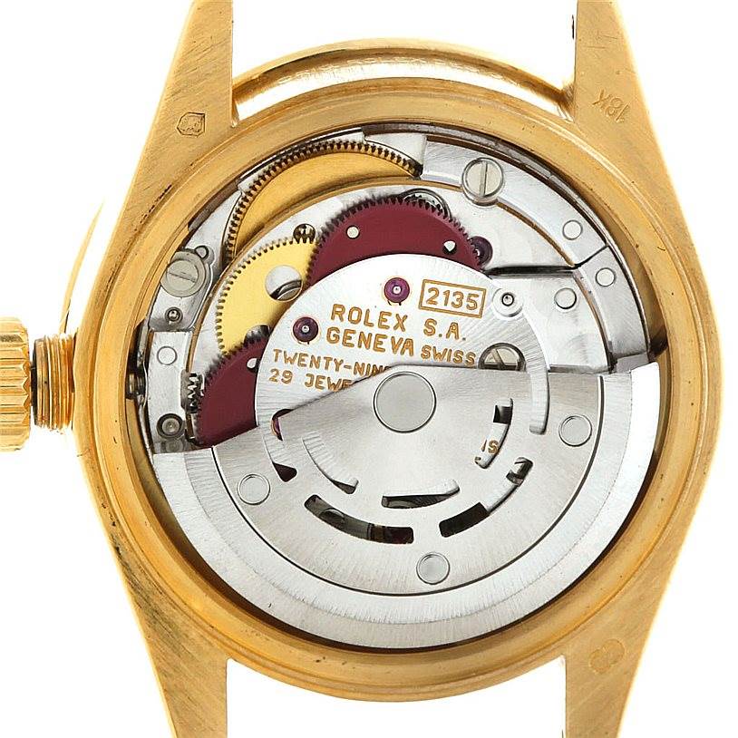 This image shows the internal mechanics of a Rolex President 69138 Women's Yellow Gold Blue Dial 69138 Women's Yellow Gold Blue Dial model watch from a back view angle.