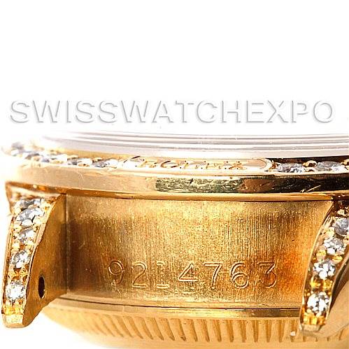 The image shows a side view of the case and lugs of the Rolex President 69158 Women's Yellow Gold Champagne Dial 69158 Women's Yellow Gold Champagne Dial model, highlighting its serial number and diamond accents.