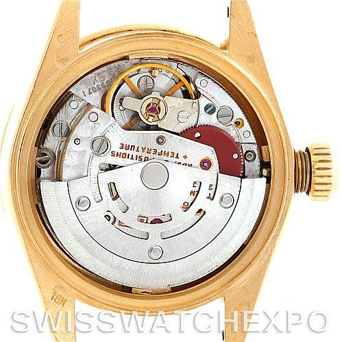 The image shows the movement and internal mechanisms of a Rolex President 69158 Women's Yellow Gold Champagne Dial 69158 Women's Yellow Gold Champagne Dial model watch from a rear angle.