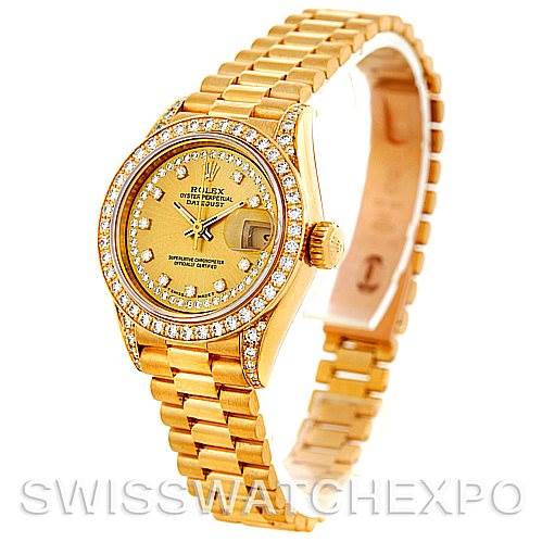 This image shows a Rolex President 69158 Women's Yellow Gold Champagne Dial 69158 Women's Yellow Gold Champagne Dial model watch at an angled view, featuring a gold band, diamond bezel, and detailed dial.