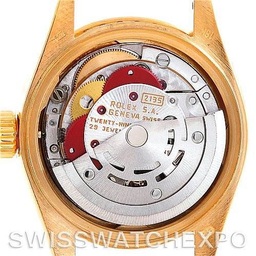 The image shows the rear view of the movement parts of a Rolex President 69158 Women's Yellow Gold Champagne Dial 69158 Women's Yellow Gold Champagne Dial model watch, revealing its internal mechanism.