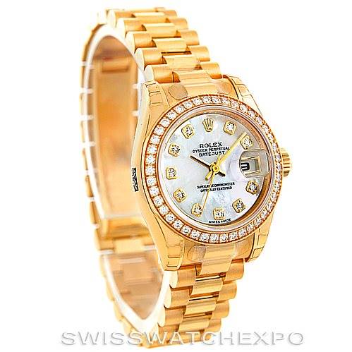 The image shows a Rolex President 179138 Women's Yellow Gold Mother of Pearl Dial 179138 Women's Yellow Gold Mother of Pearl Dial model watch at a slight angle, highlighting the gold bracelet, diamond bezel, and dial.