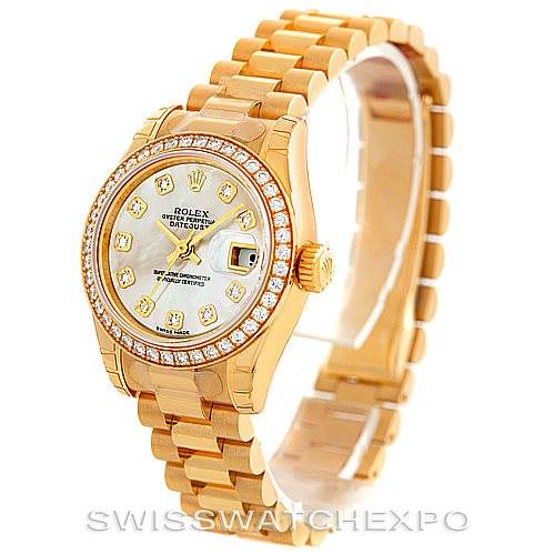 The image shows a Rolex President 179138 Women's Yellow Gold Mother of Pearl Dial 179138 Women's Yellow Gold Mother of Pearl Dial model watch, featuring a gold bracelet, diamond bezel, and mother-of-pearl dial, displayed at a three-quarter angle.