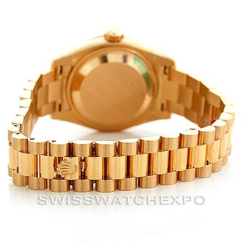 This image shows the back case and bracelet of a Rolex President 179138 Women's Yellow Gold Mother of Pearl Dial 179138 Women's Yellow Gold Mother of Pearl Dial model watch, highlighting the clasp with the Rolex logo.