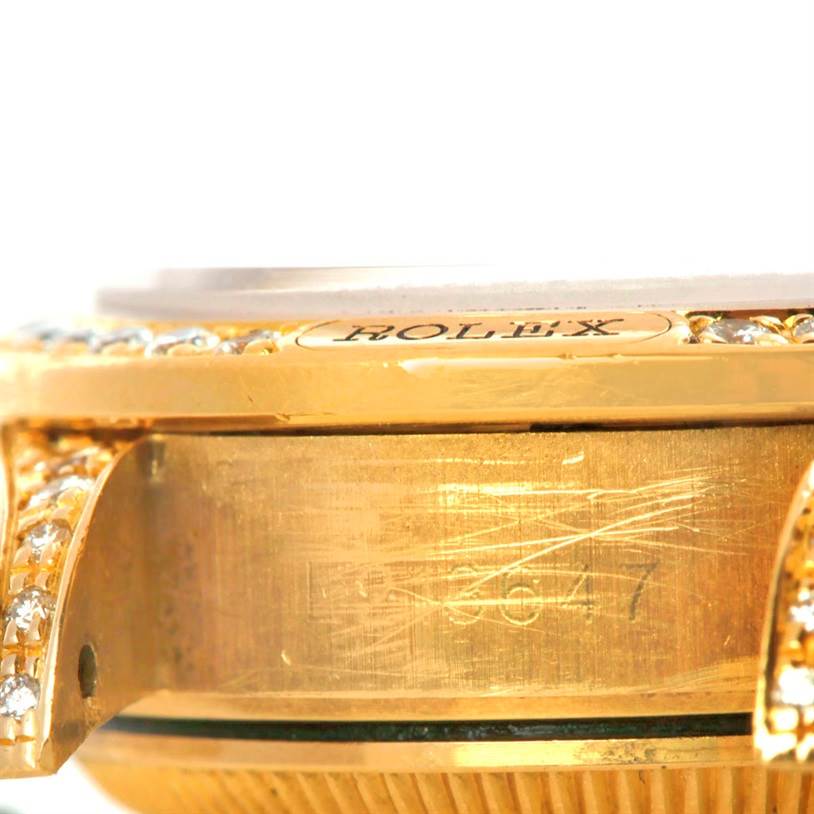 This image shows a close-up side view of a Rolex President 69158 Women's Yellow Gold Black Dial 69158 Women's Yellow Gold Black Dial model watch case with part of the bezel and lugs visible.