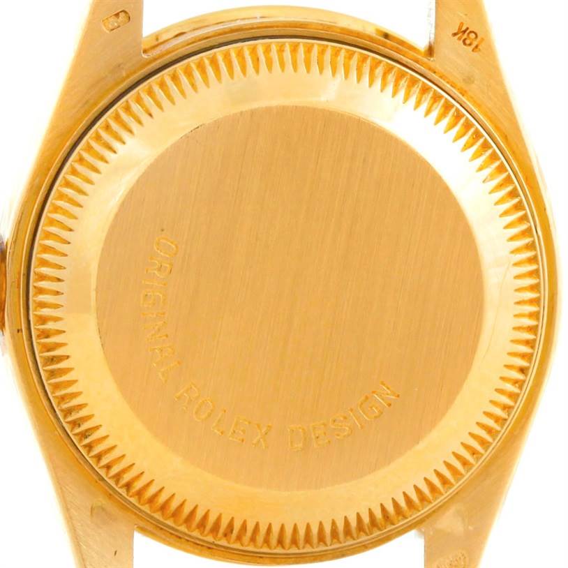 The image shows the back case of a Rolex President 69158 Women's Yellow Gold Black Dial 69158 Women's Yellow Gold Black Dial model watch in gold, viewed directly from the rear.