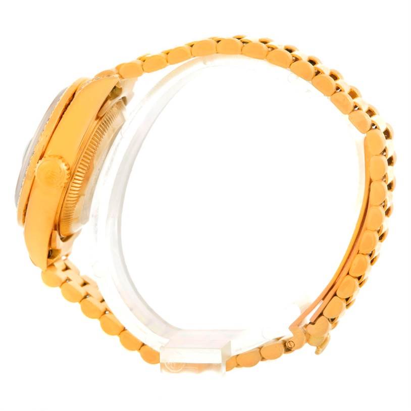 The image shows a side view of a Rolex President 69158 Women's Yellow Gold Black Dial 69158 Women's Yellow Gold Black Dial model watch, highlighting the gold bracelet and case.