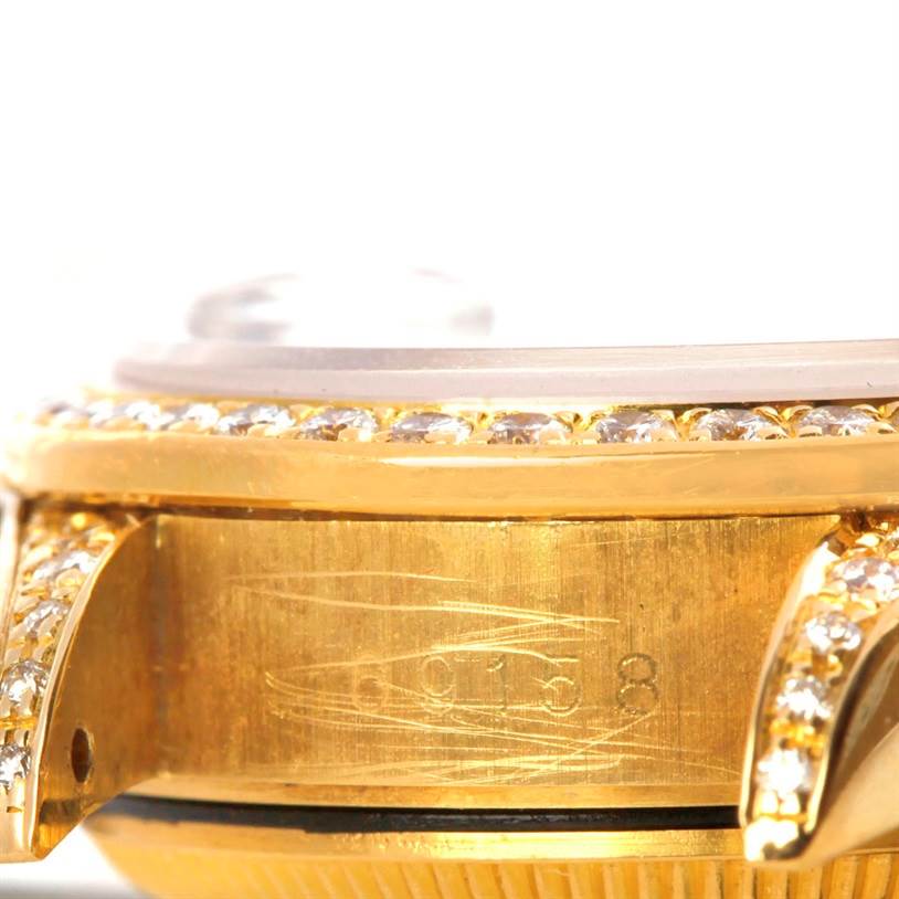 The image shows a close-up side view of a Rolex President 69158 Women's Yellow Gold Black Dial 69158 Women's Yellow Gold Black Dial model, highlighting the case, bezel with diamonds, and part of the lug.