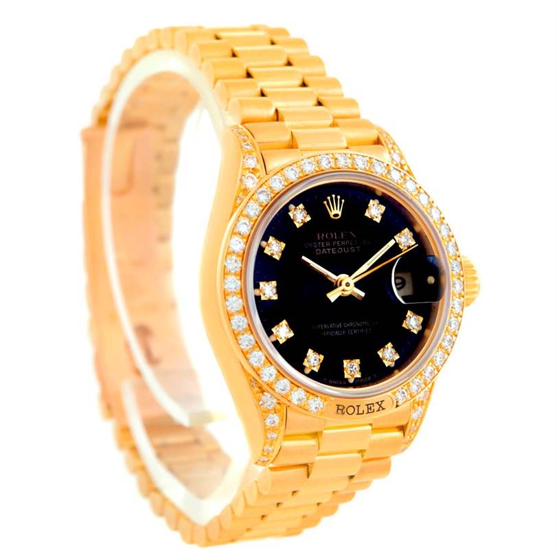 The image shows a Rolex President 69158 Women's Yellow Gold Black Dial 69158 Women's Yellow Gold Black Dial model watch, displaying the face, bezel, and part of the bracelet at an angle.